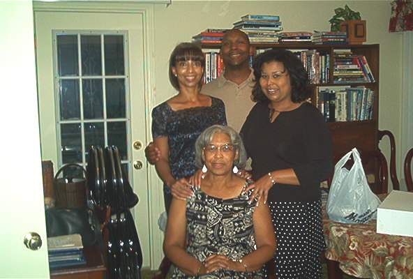 Mrs. Washington with her kids: Anita, Terry, and Valerie